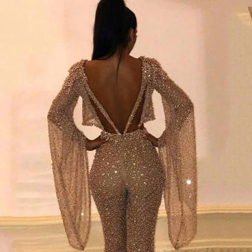 Sexy Backless Hollow Bandage Jumpsuit Women Spring O-neck Flare Sleeve Straight Playsuit Fall Sequin Shiny Party Romper Overalls