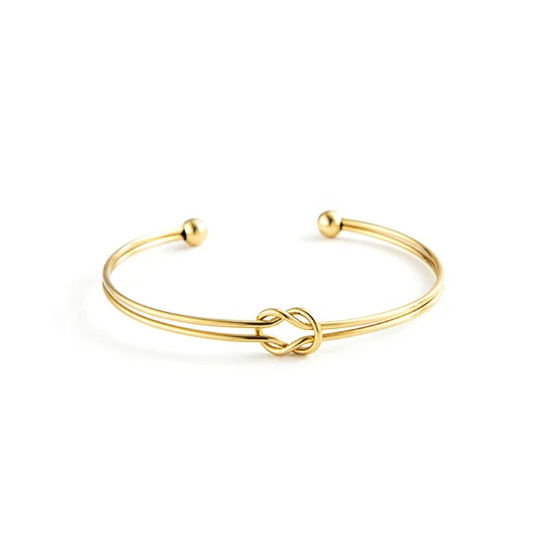 SLOONG Golden Stainless Steel Knot Design Cuff Bangle: High Quality and Symbolic and Stylish
