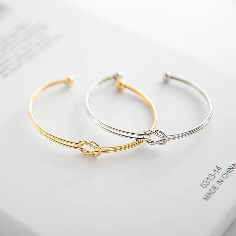 SLOONG Golden Stainless Steel Knot Design Cuff Bangle: High Quality and Symbolic and Stylish