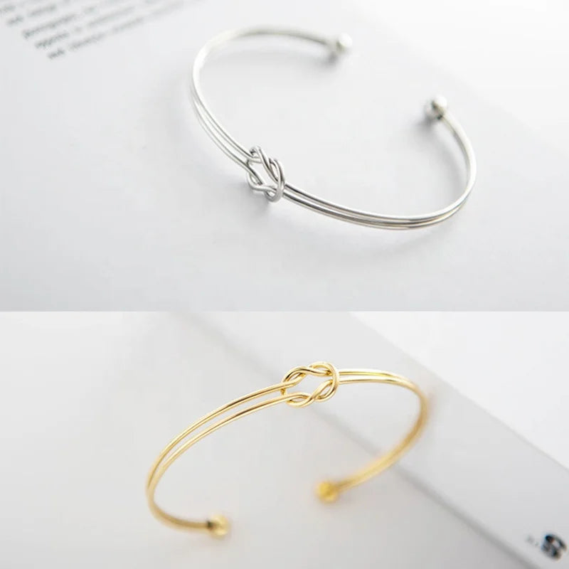 SLOONG Golden Stainless Steel Knot Design Cuff Bangle: High Quality and Symbolic and Stylish