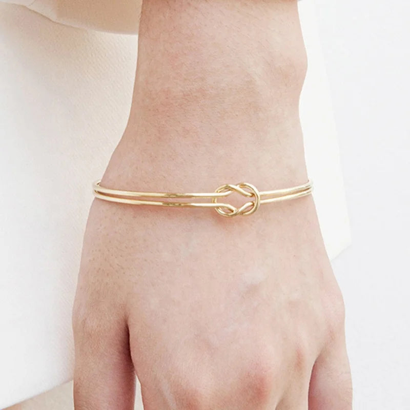 SLOONG Golden Stainless Steel Knot Design Cuff Bangle: High Quality and Symbolic and Stylish