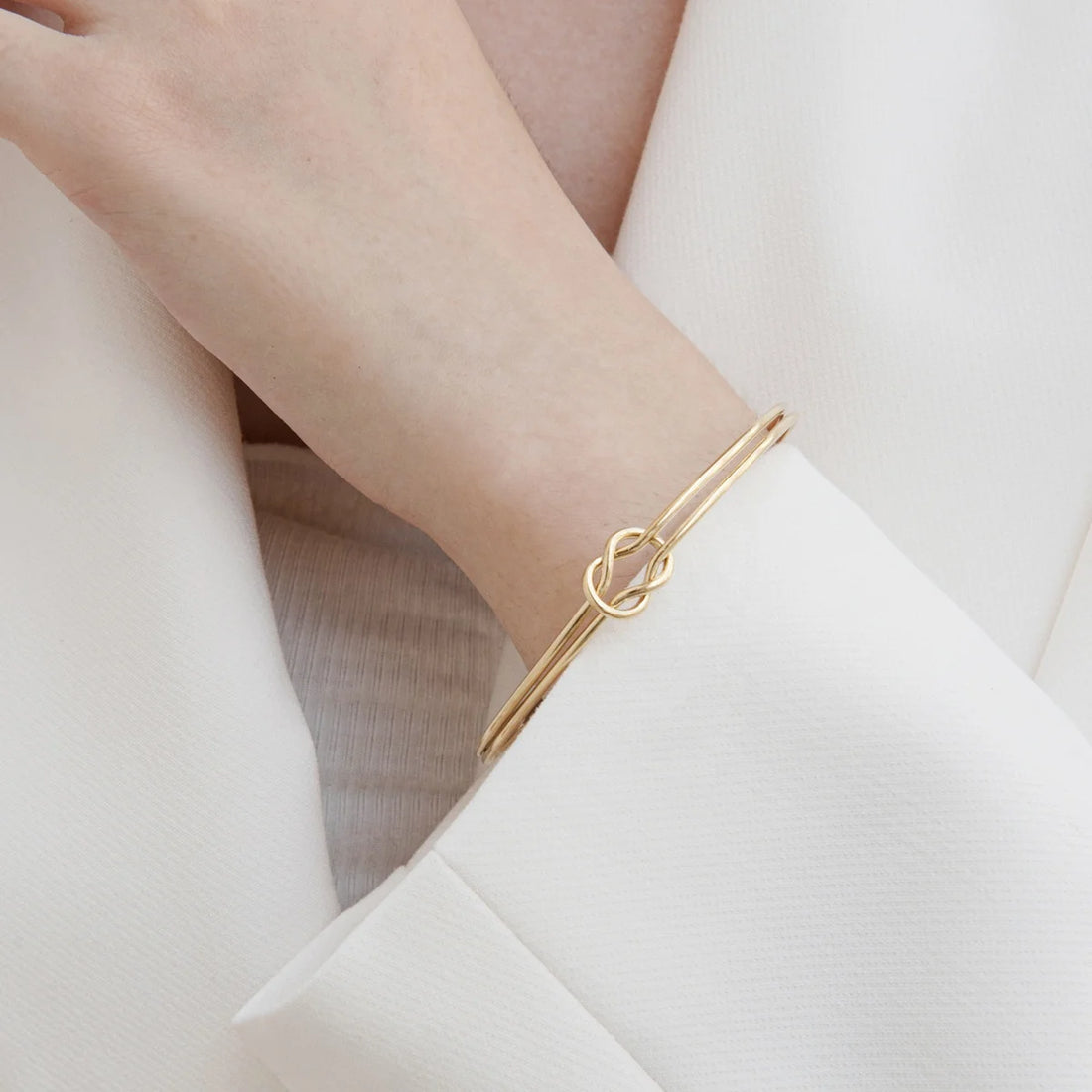 SLOONG Golden Stainless Steel Knot Design Cuff Bangle: High Quality and Symbolic and Stylish