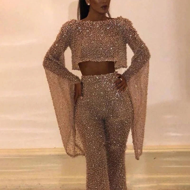 Sexy Backless Hollow Bandage Jumpsuit Women Spring O-neck Flare Sleeve Straight Playsuit Fall Sequin Shiny Party Romper Overalls